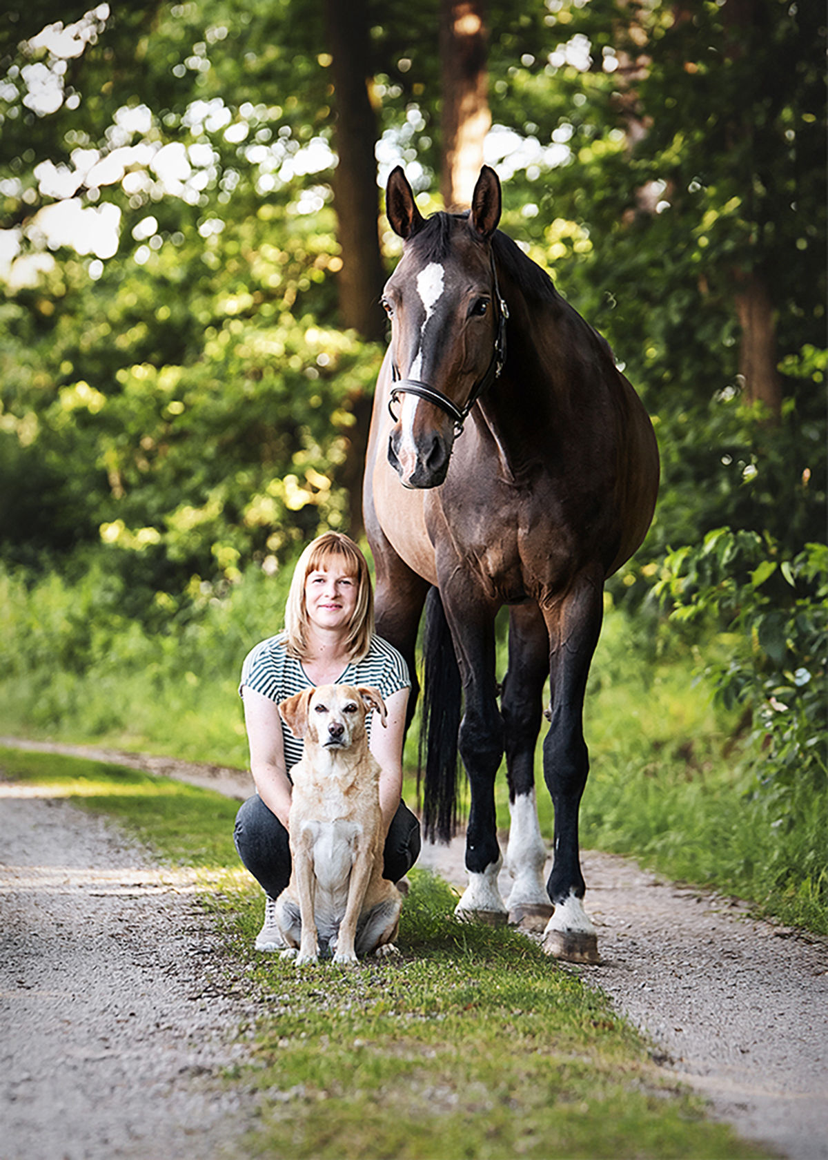 Melanie Haug mit Hund und Pferd